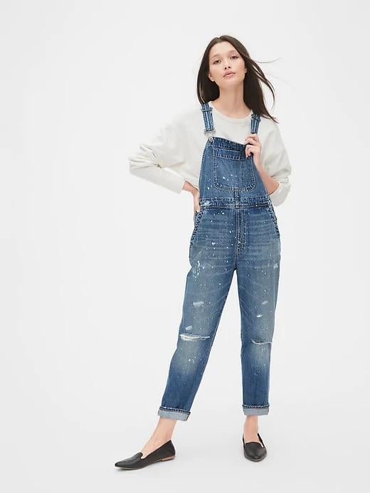 Have you heard? Distressed Lived-In Denim Overalls ($128) like these are the perfect balance of cool, casual, and timeless. What's more, they're easy to layer on top of a sweater