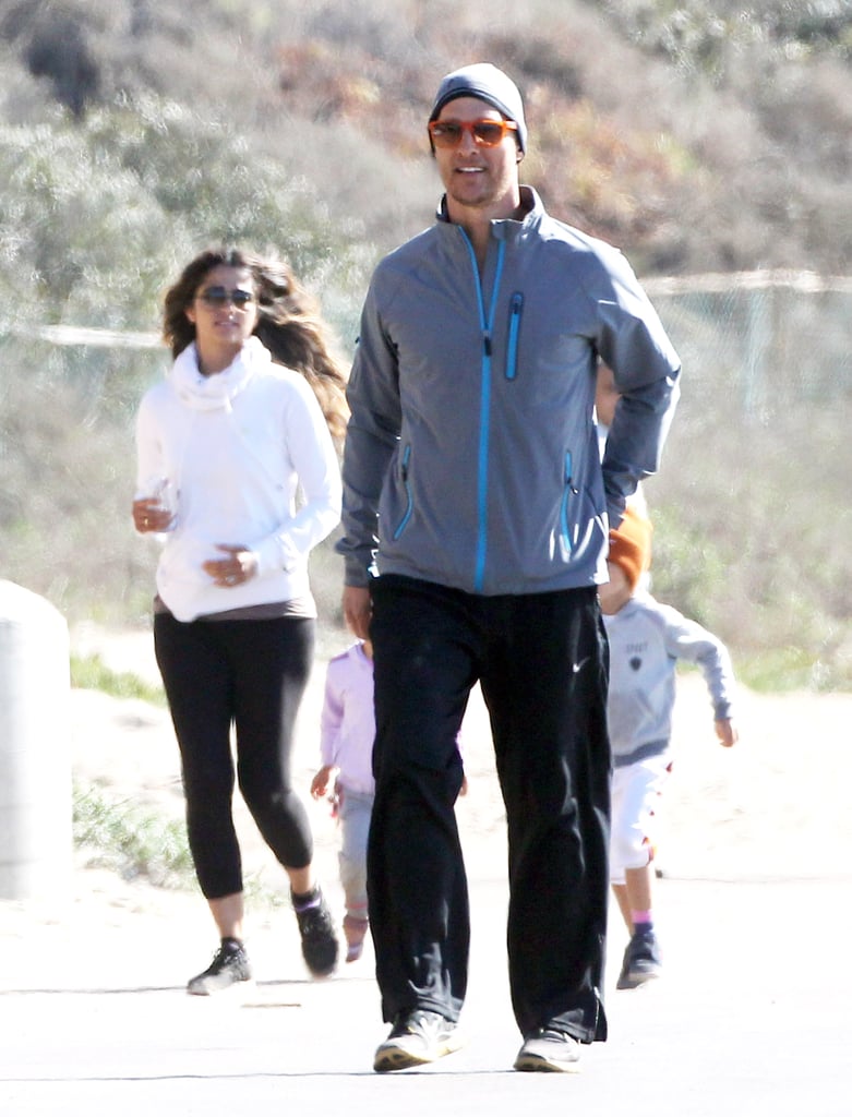 Matthew and Camila smiled as they jogged.