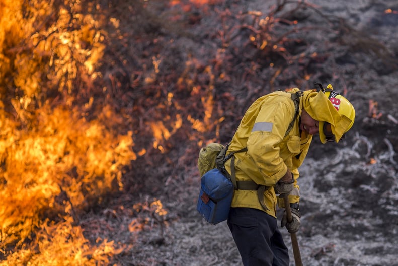 A firefighter fights the La Tuna Fire on Sept. 2.
