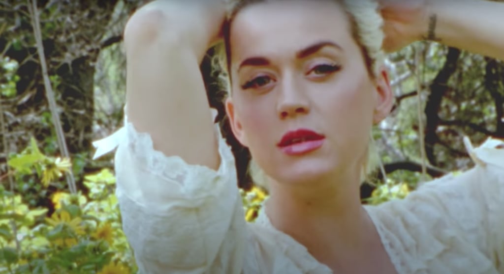 See Katy Perry's White Lace Dresses in "Daisies" Music Video