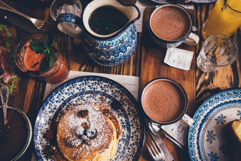 Indulge in hot cocoa for breakfast, along with stacks of gingerbread pancakes.