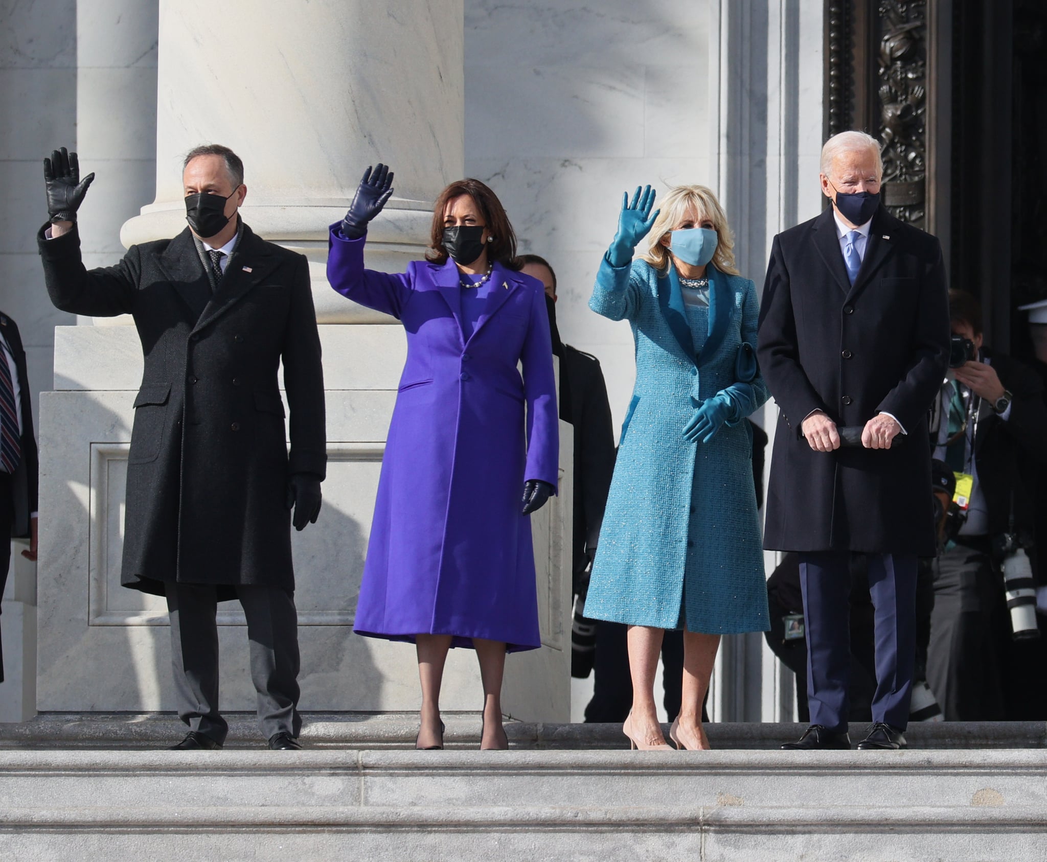 WASHINGTON, DC - JANUARY 20: (EDITOR'S NOTE: Alternate crop) (L-R) Doug Emhoff, U.S. Vice President-elect Kamala Harris, Jill Biden and President-elect Joe Biden wave as they arrive on the East Front of the U.S. Capitol for  the inauguration on January 20, 2021 in Washington, DC.  During today's inauguration ceremony Joe Biden becomes the 46th president of the United States. (Photo by Joe Raedle/Getty Images)