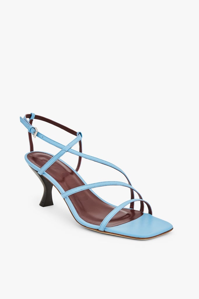 "Speaking of barely there strappy sandal, how fun is this powder blue Staud Gita Sandal ($325)? It's a great pop with printed pieces or simple denim outfits." — LL