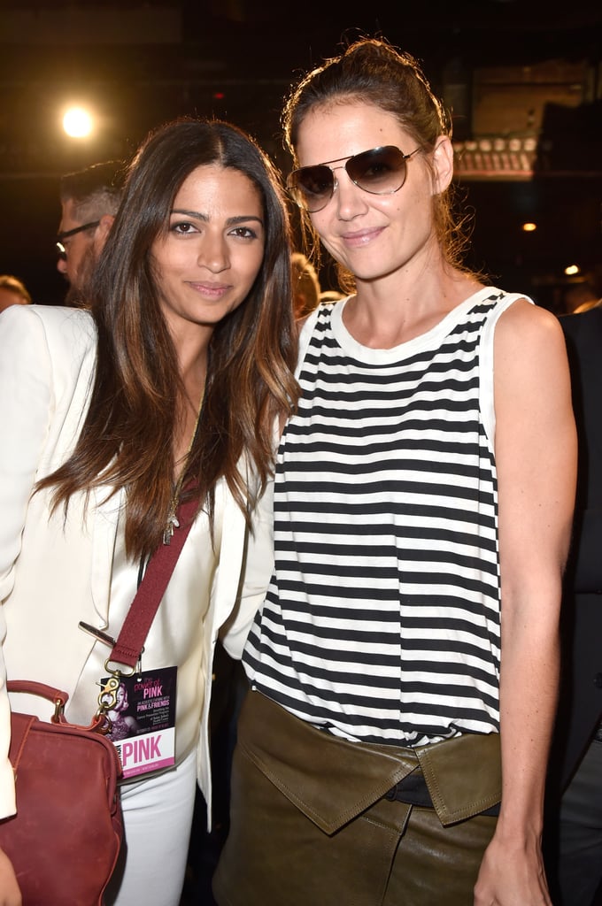 Camila Alves and Katie Holmes linked up at the Power of Pink event benefiting cancer prevention at the House of Blues in West Hollywood, CA, on Thursday.