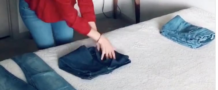 We Can't Stop Watching This Simple and Genius Hack For Folding Jeans