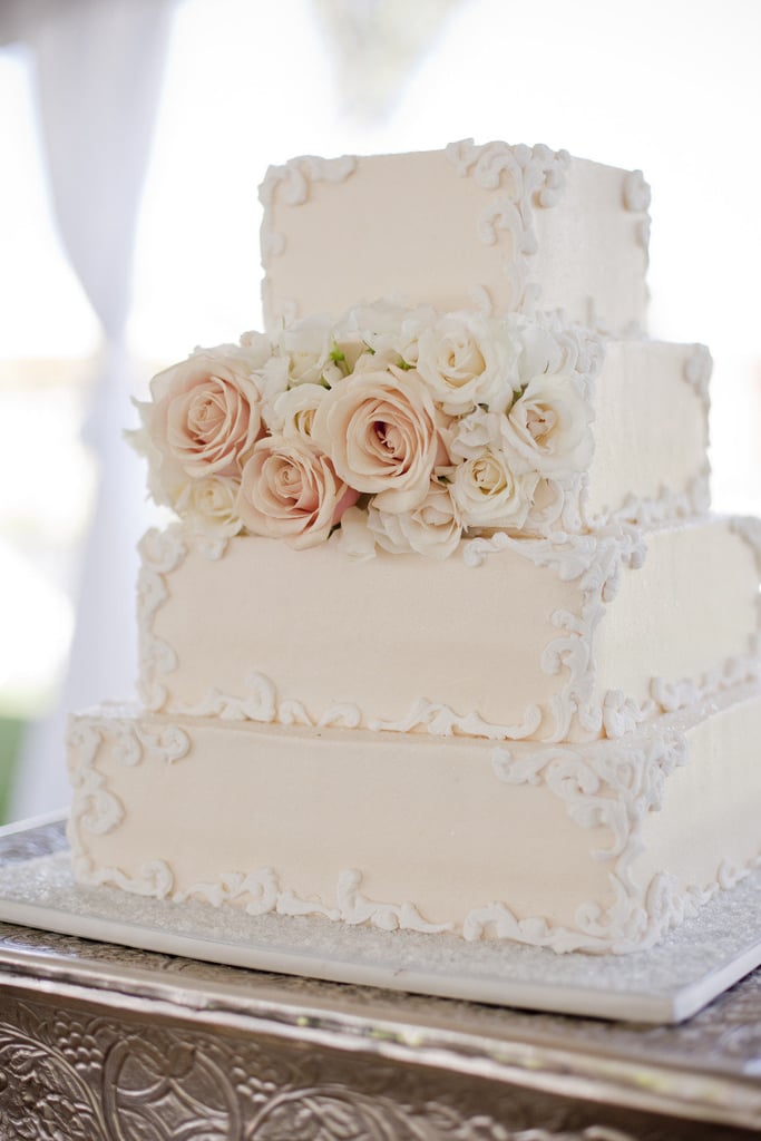 Tradition meets style when it comes to this pretty, off-white, square cake.  
Photo by Elyse Hall Photography via Style Me Pretty