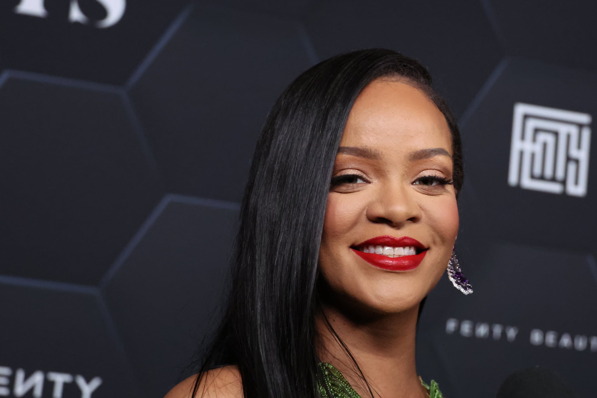 LOS ANGELES, CALIFORNIA - FEBRUARY 11: Rihanna poses for a picture as she celebrates her beauty brands fenty beauty and fenty skin at Goya Studios on February 11, 2022 in Los Angeles, California. (Photo by Mike Coppola/Getty Images)