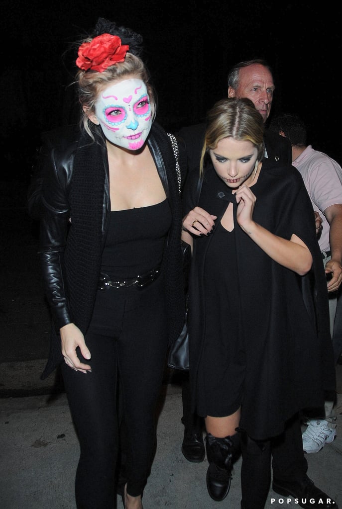 Kate Hudson sported Dia de los Muertos face paint as she arrived with pal Ashley Benson.