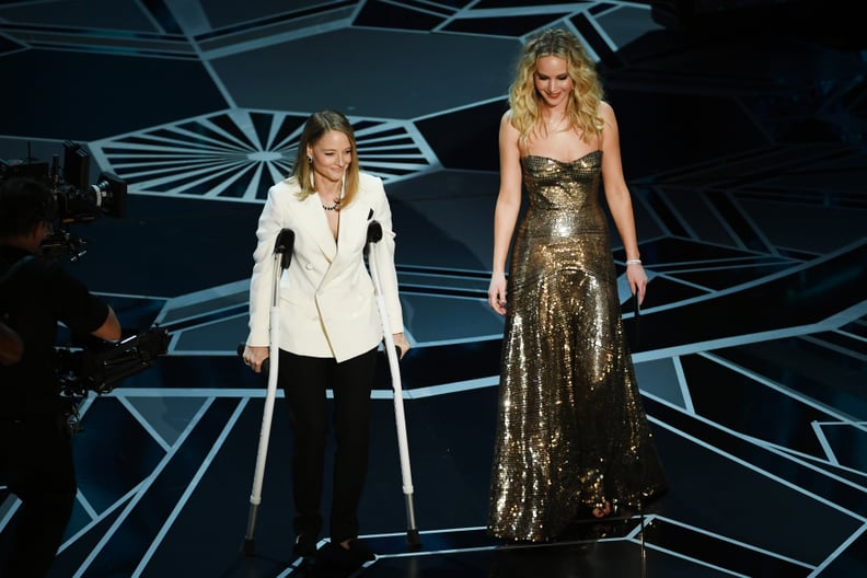 HOLLYWOOD, CA - MARCH 04:  Actors Jodie Foster (L) and Jennifer Lawrence speak onstage during the 90th Annual Academy Awards at the Dolby Theatre at Hollywood & Highland Center on March 4, 2018 in Hollywood, California.  (Photo by Kevin Winter/Getty Image