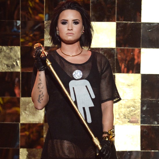 Demi Lovato Wearing Gender Neutral Bathroom Shirt on Stage