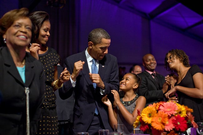 Obama and Sasha dancing along to music at the Fiesta Latina event held at the White House.
