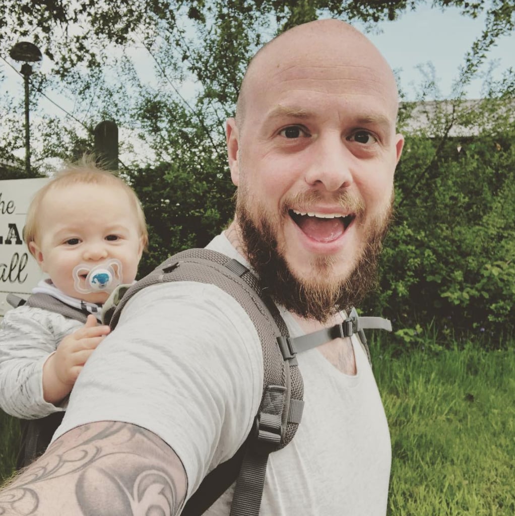 This dad and his babe are all smiles.