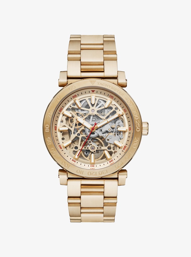 What could be more classic than a gold Michael Kors watch? We love how the Greer style ($425) completely exposes the inside of the dial. Any guy would get a kick out of that.
