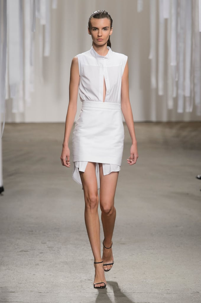 A long button-down tucked into a miniskirt.