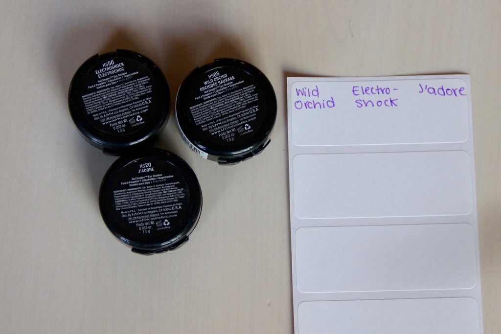Before you remove an eye shadow from its packaging, make sure to write down the brand and color name of the product on a label in case you'd like to repurchase it in the future. (You'll be using these later!)