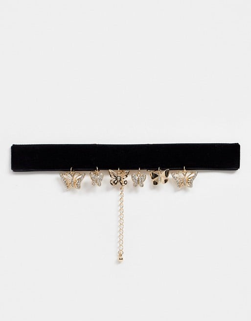 ASOS DESIGN choker with hanging butterfly charms in gold tone