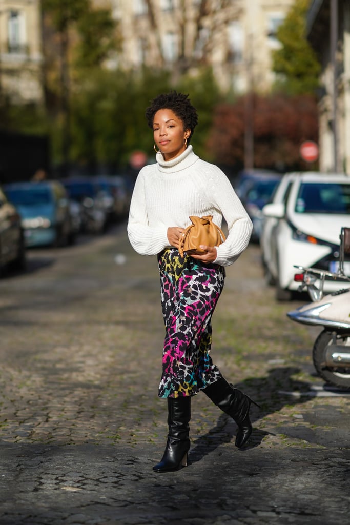 Wear a thick turtleneck with a silk midi skirt and tall boots that rise to your knee.