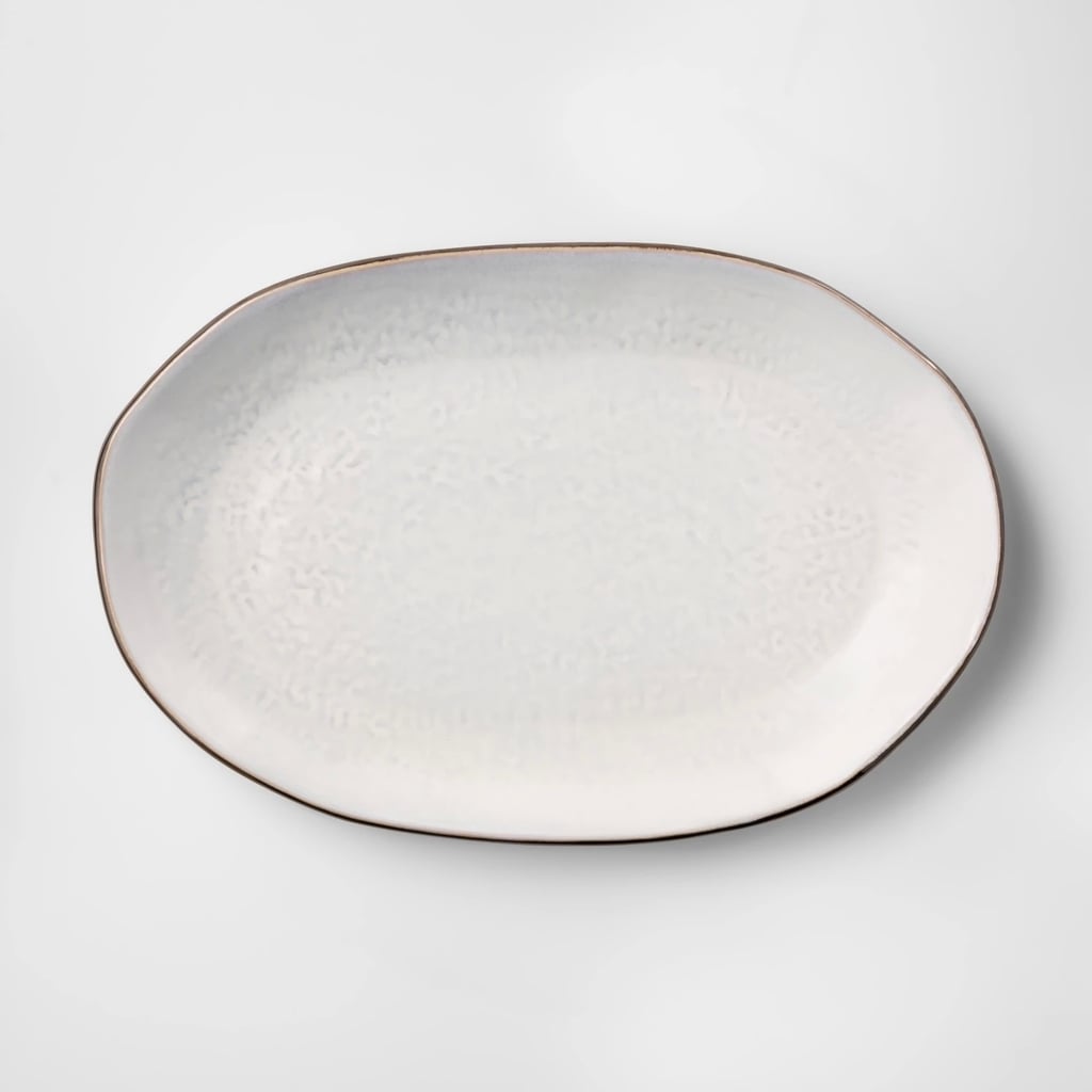 Cravings by Chrissy Teigen 16" Oval White Stoneware Platter With Brown Rim