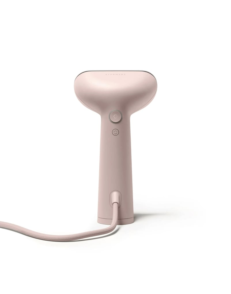 Steamery Cirrus 3 Iron Steamer in Rose ($180)
For someone who wears as many dresses as I do, it's important to invest in a steamer that will ensure I stay wrinkle-free without damaging my clothes. The Steamery Cirrus 3 produces high-quality, dry steam and since you can press it against your garment, it functions like an iron and steamer in one.
