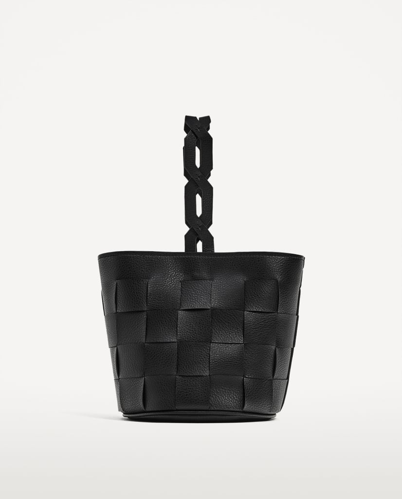 Zara's geometric bucket bag ($40) has the kind of elevated detail that looks like it cost a fortune.