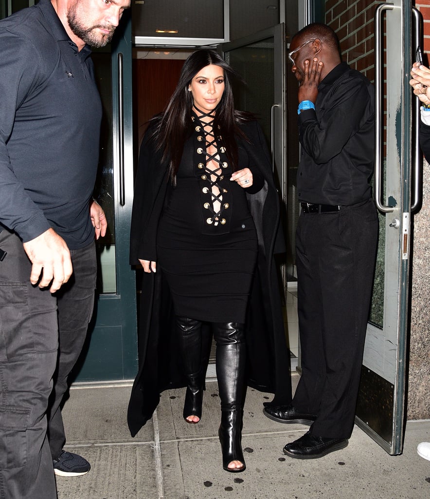 If you thought plunging necklines were a no-go while pregnant, you clearly aren't taking tips from Kim, who laced up in this look for Carine Roitfeld's NYFW dinner.