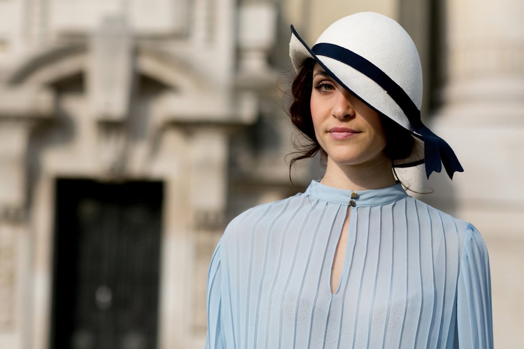 Vintage curls go perfectly with a vintage hat.