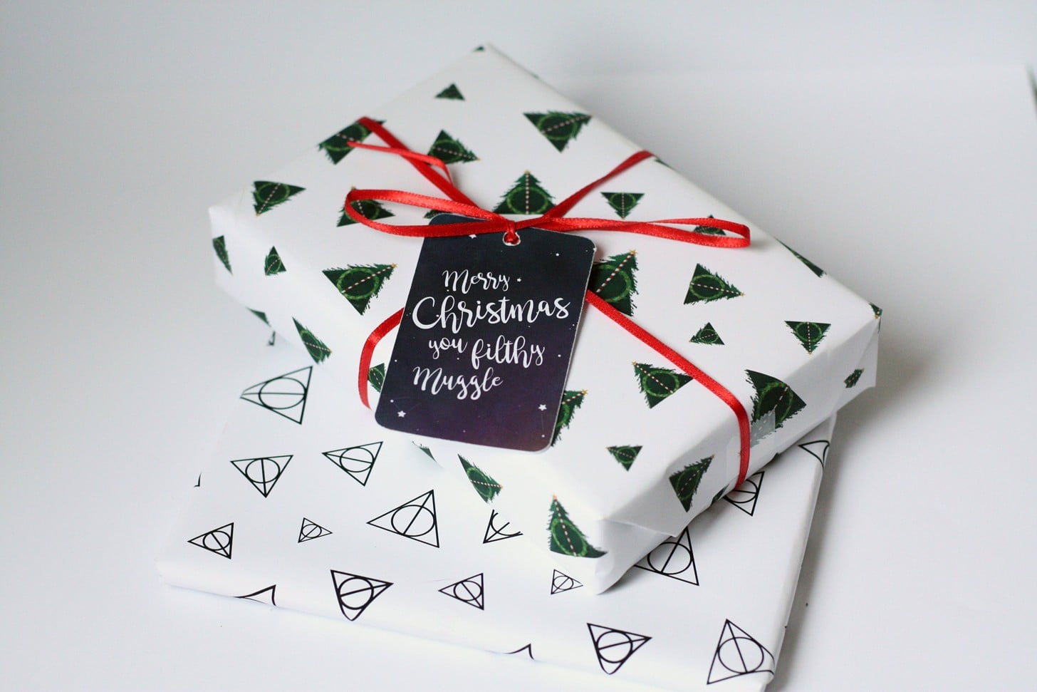 This Harry Potter Holiday Wrapping Paper Is Almost Too Magical to Rip Open  - Tinybeans