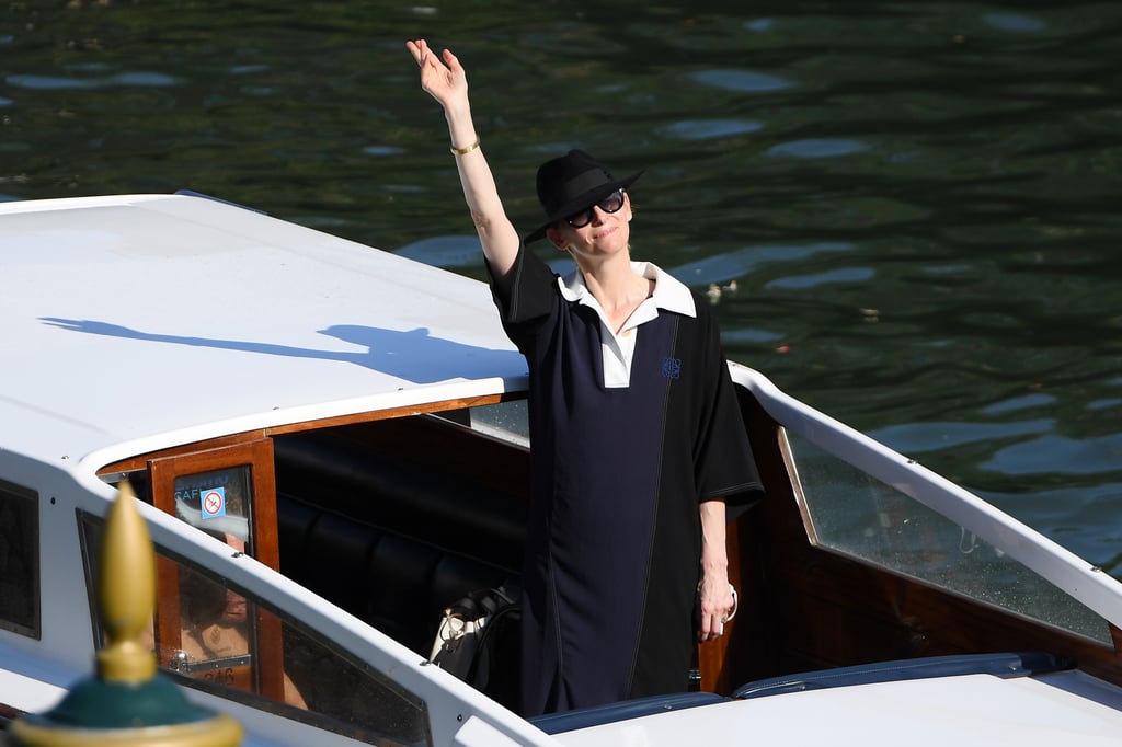 Tilda Swinton coordinated her hat and tunic while out at the festival.