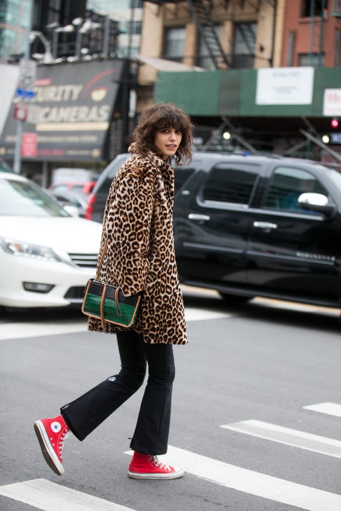 Style Your Leopard-Print Coat With: Black Jeans, Sneakers, and a Coloured Bag