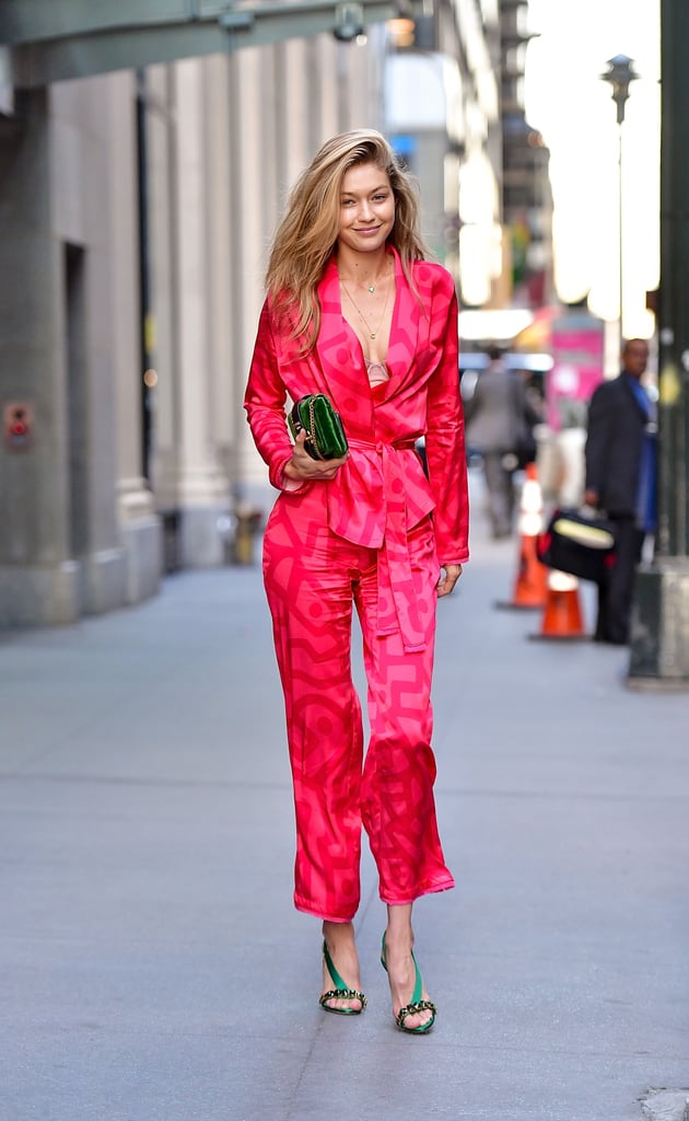 In Sept. 2017, Gigi wore a March 11 suit with green Olgana Paris heels and a Prada Cahier bag.