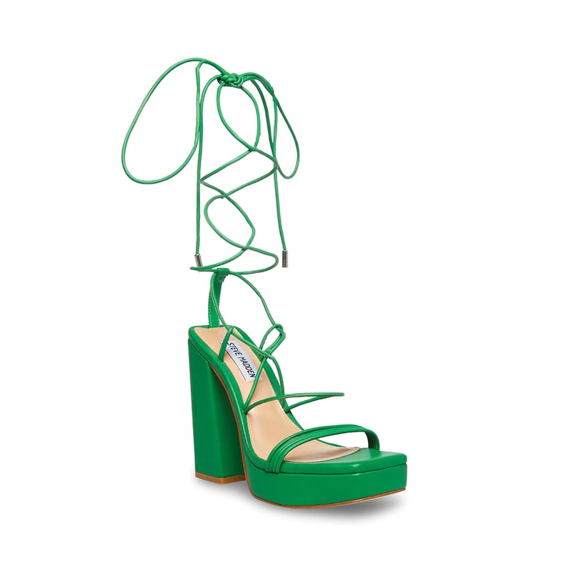 How Peloton's Olivia Amato Walks in Versace Platform Shoes | POPSUGAR ...