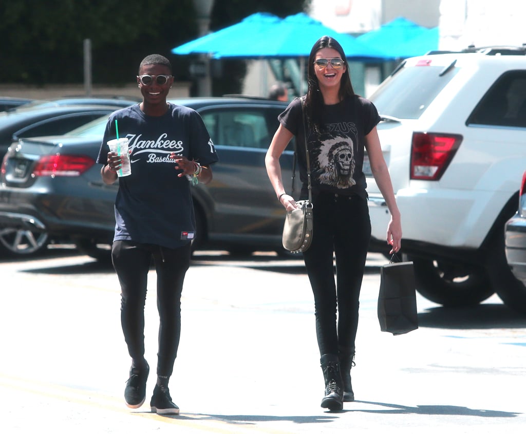 Kendall Jenner wore a "Yeezus" t-shirt while going on a coffee run with a pal in LA on Wednesday.