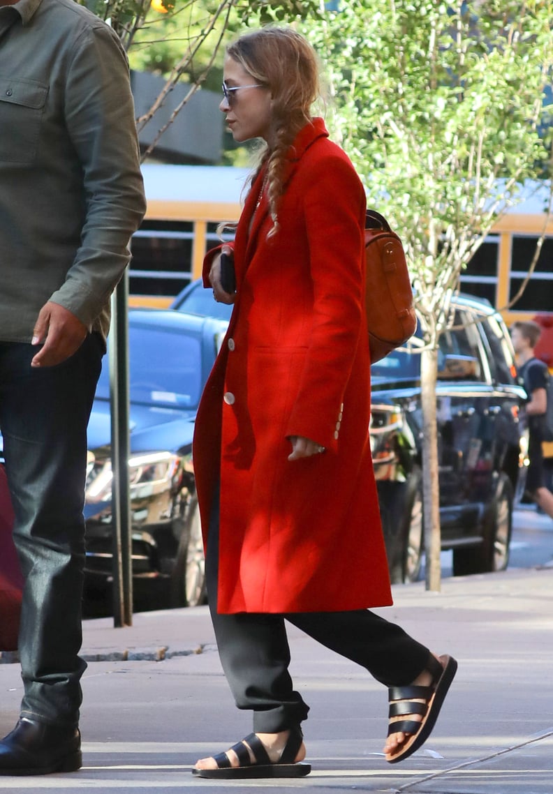 Mary-Kate Paired Black Pants With Sandals, Then Topped Things Off With a Red Coat