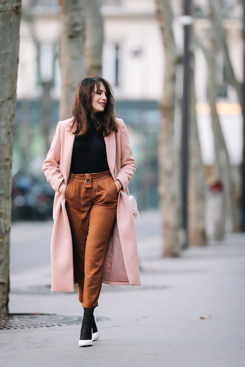 A Long Pink Coat, a Turtleneck, Cigarette Trousers, and Heels