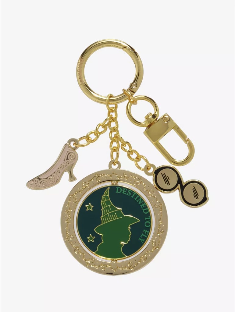 BoxLunch Loungefly Wicked Glinda Initial Multi-Charm Keychain ($17)
Tap into the magic of the "Wicked" universe with a statement keychain that pays homage to Elphaba. The accessory has a standard clip design so you can attach it to everything from your car key chain to a charm-compatible phone case and more.