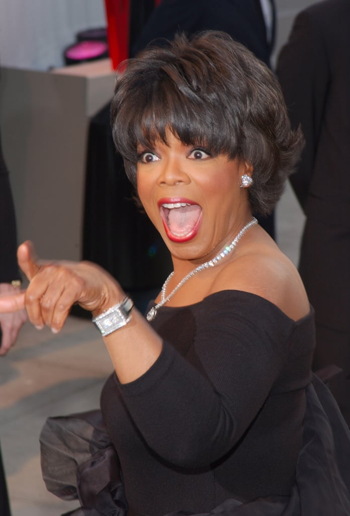 Oprah flashed a smile and a finger at the 2002 Vanity Fair Oscar party.