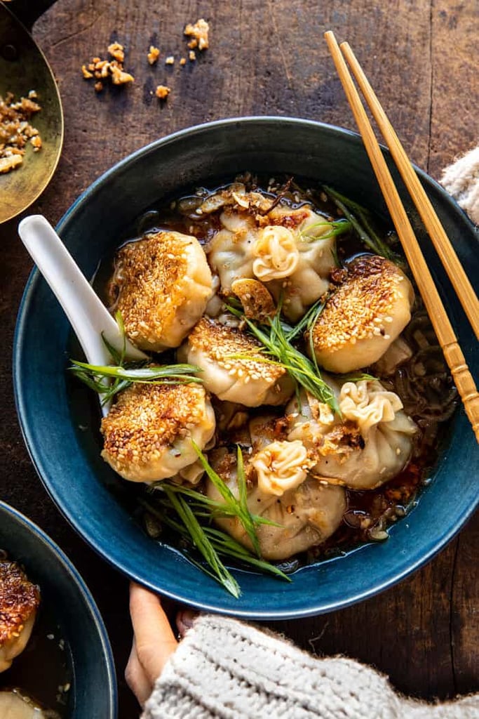 Sesame Chicken Dumplings in Spicy Broth with Garlic Crisps