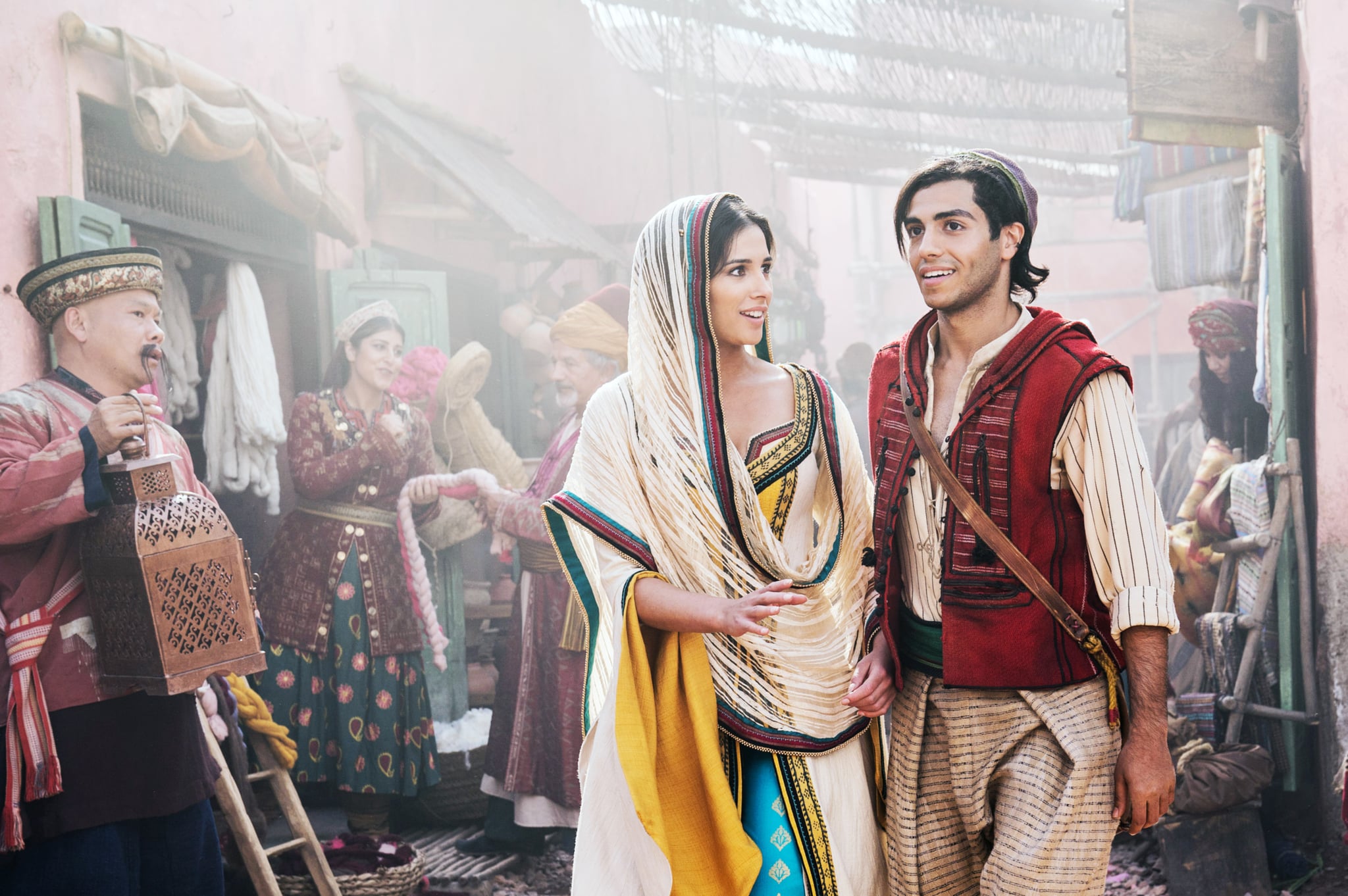 ALADDIN, from left: Naomi Scott as Jasmine, Mena Massoud as Aladdin, 2019. ph: Daniel Smith /  Walt Disney Studios Motion Pictures / courtesy Everett Collection