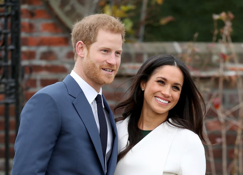 LONDON, ENGLAND - NOVEMBER 27:  Prince Harry and actress Meghan Markle during an official photocall to announce their engagement at The Sunken Gardens at Kensington Palace on November 27, 2017 in London, England.  Prince Harry and Meghan Markle have been 