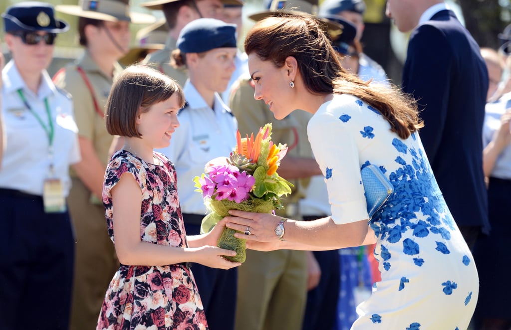 In April 2014, Kate received flowers from a 9-year-old girl while visiting the Royal Australian Airforce Base.