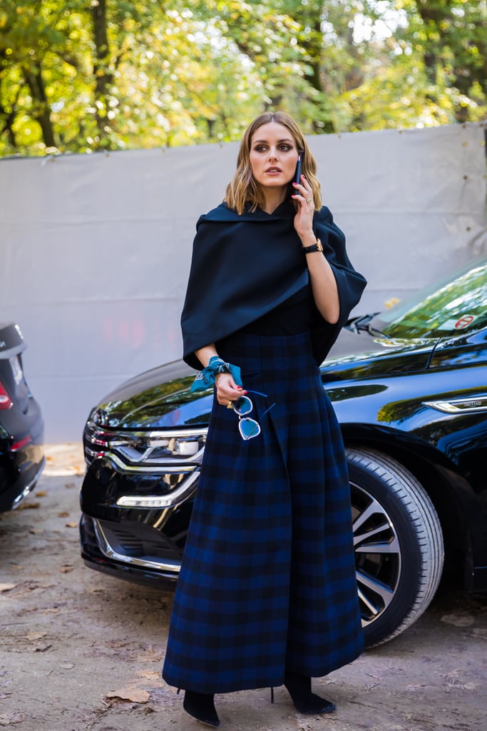 Olivia Palermo's cape just upped the drama on this look.