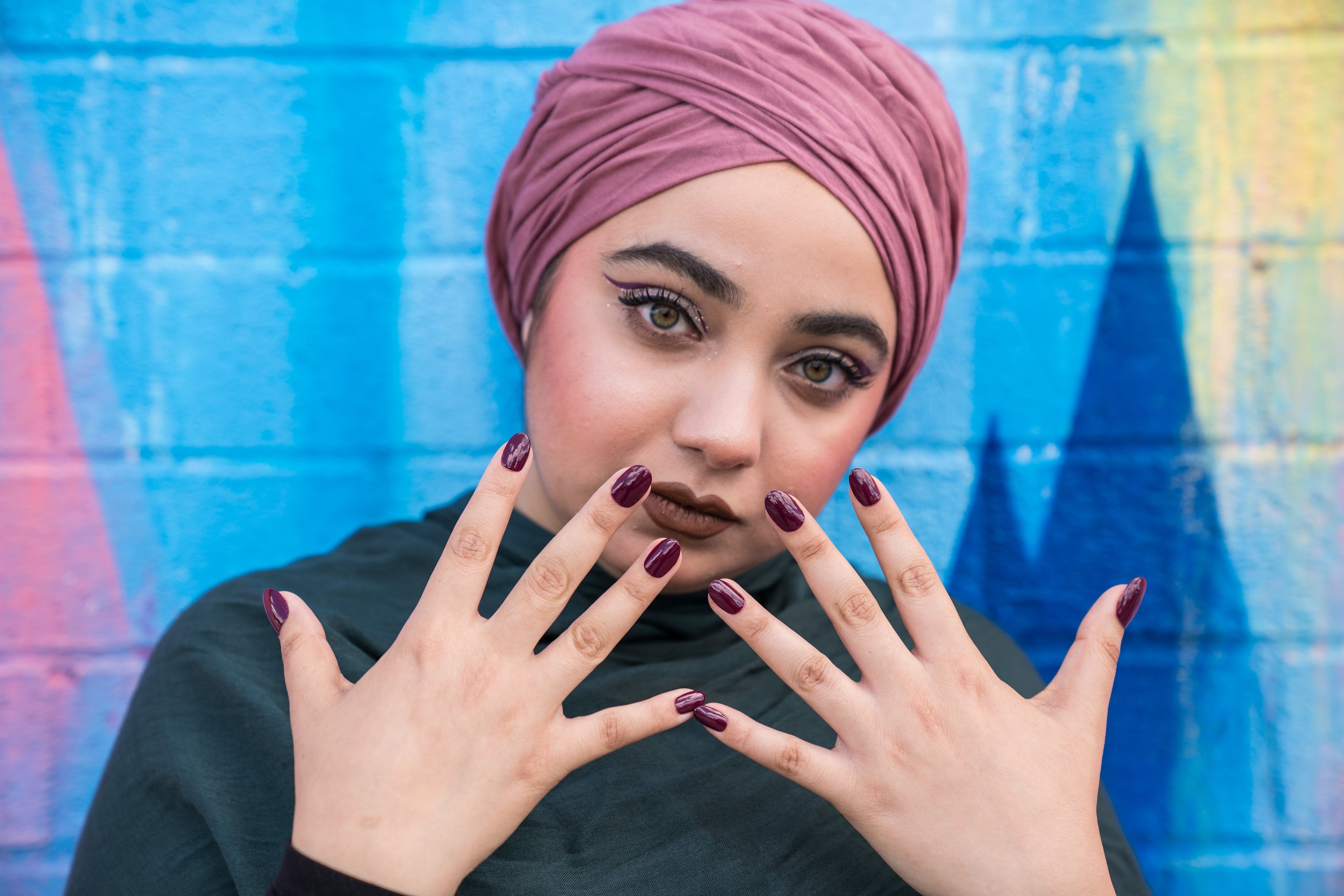 Nail tech makes nail rings so Muslim women can enjoy false nails