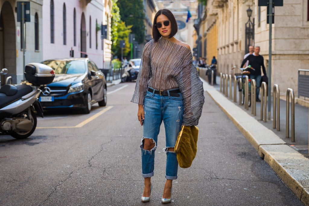 With Ripped Jeans and a Furry Clutch That Speaks to the Season | How to ...