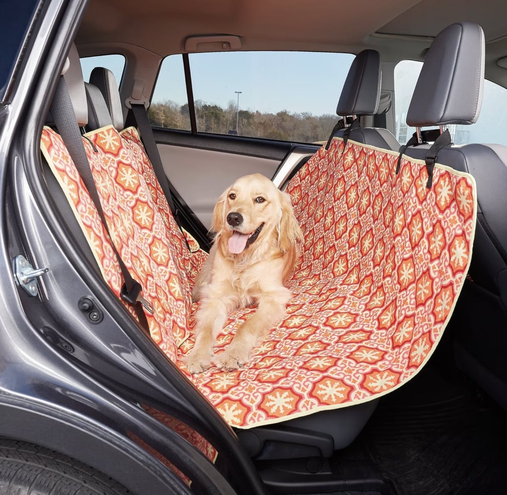 Molly Mutt Papillon Multi-Use Cargo, Hammock & Car Seat Cover ($75, originally $85) 
This viral multiuse item keeps your car clean as well as fur and scratch-free all while giving your dog a safe and comfortable ride. Alongside a machine-washable canvas, it's durable to withstand use from dogs of all sizes yet still soft to the touch.