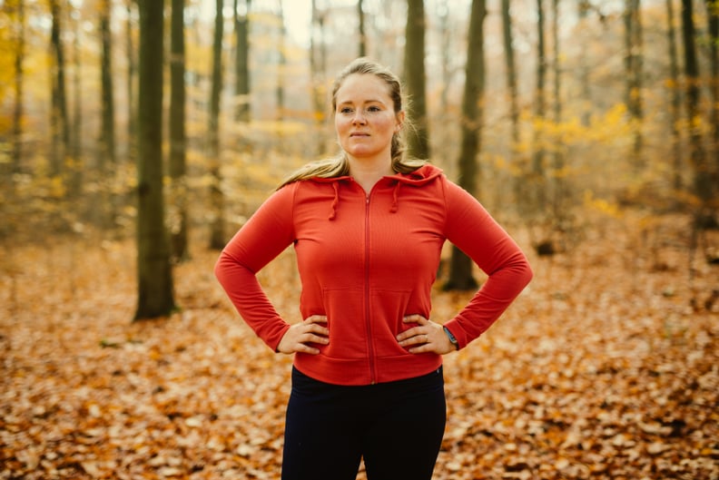 Portrait of a proud blondhaired woman after running exercise.