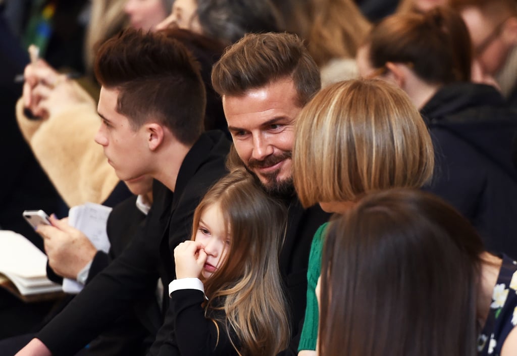David Beckham watched Victoria Beckham's presentation with their kids Harper and Brooklyn.
