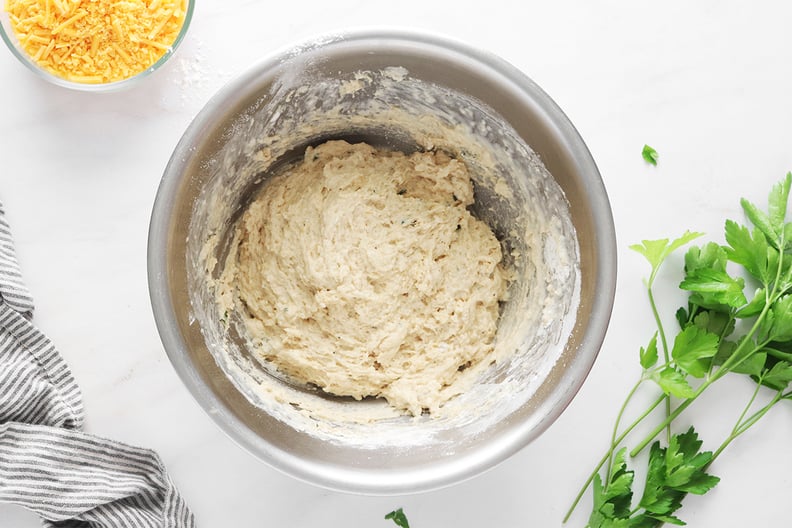 Biscuit batter in a stainless steel bowl