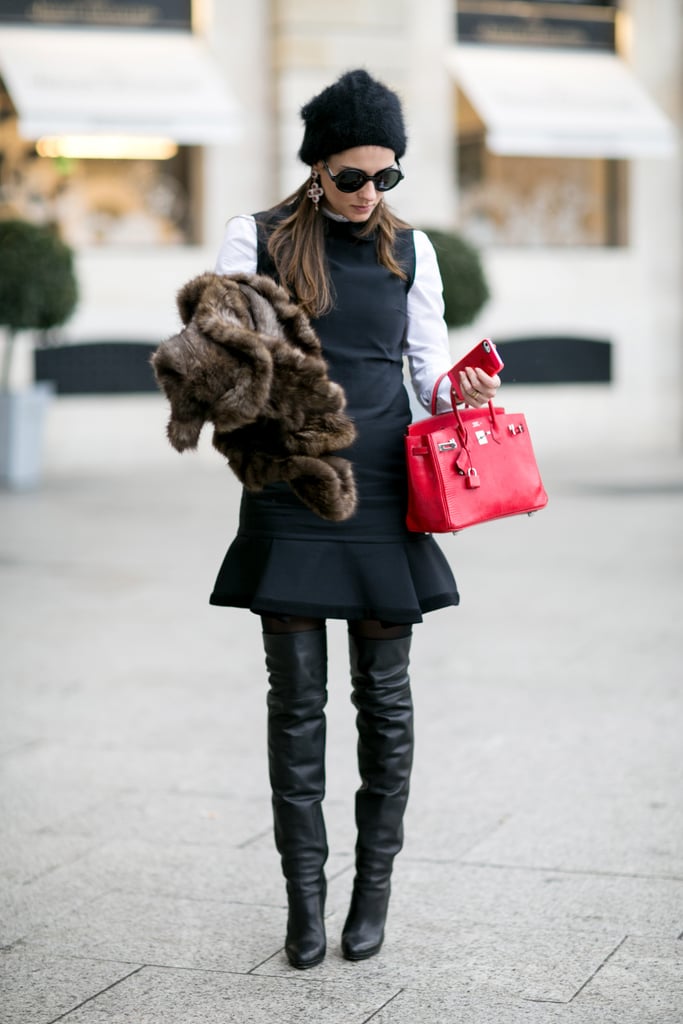 A flared hemline was made for showing off thigh-high boots. A flared hemline was made for showing off thigh-high boots.
