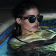 Kylie Jenner Takes a Dip in a Black Thongkini For Her Latest Shoot