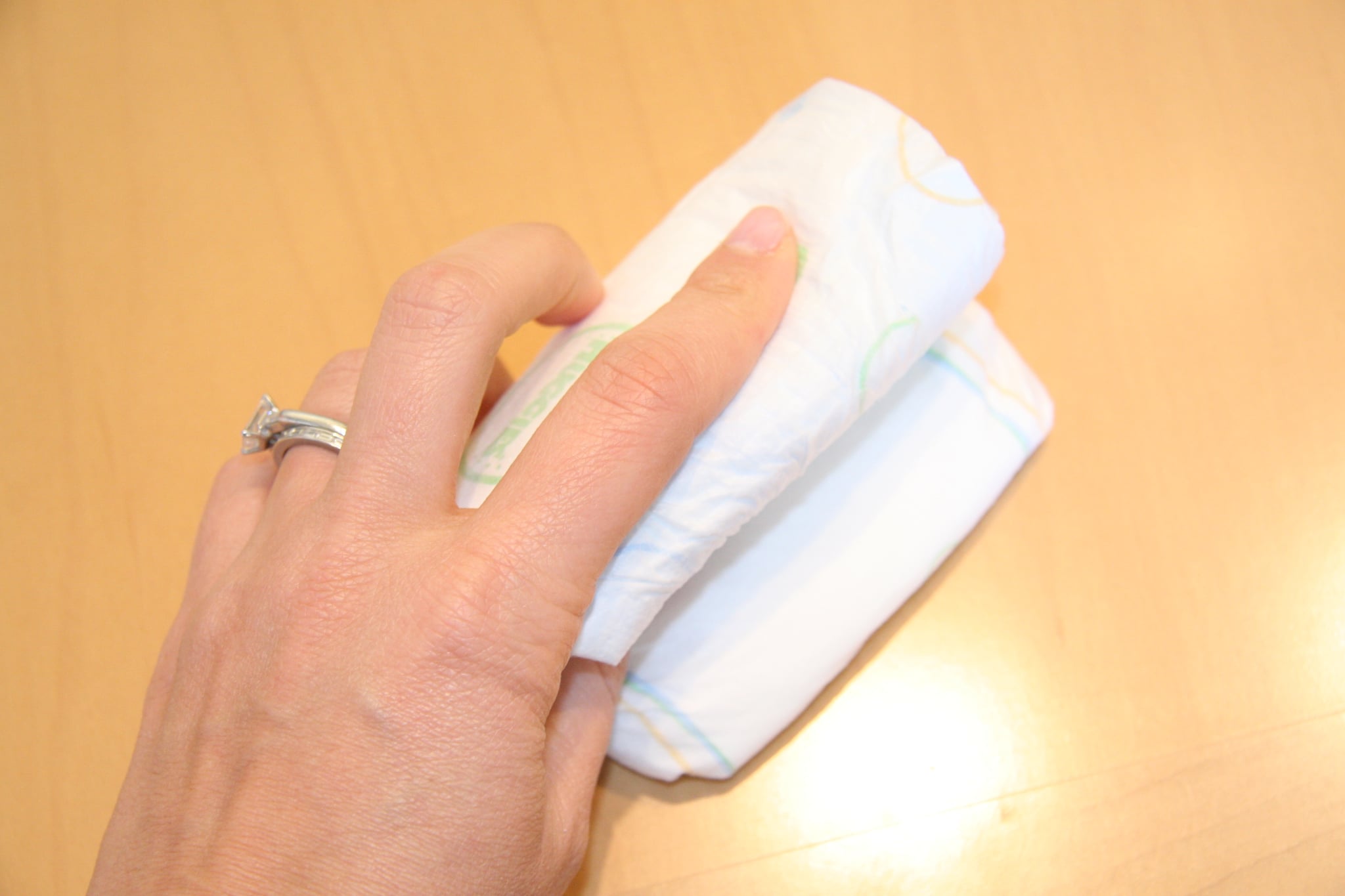 Since the loop is smaller, you will have to fold the diaper three ways. 